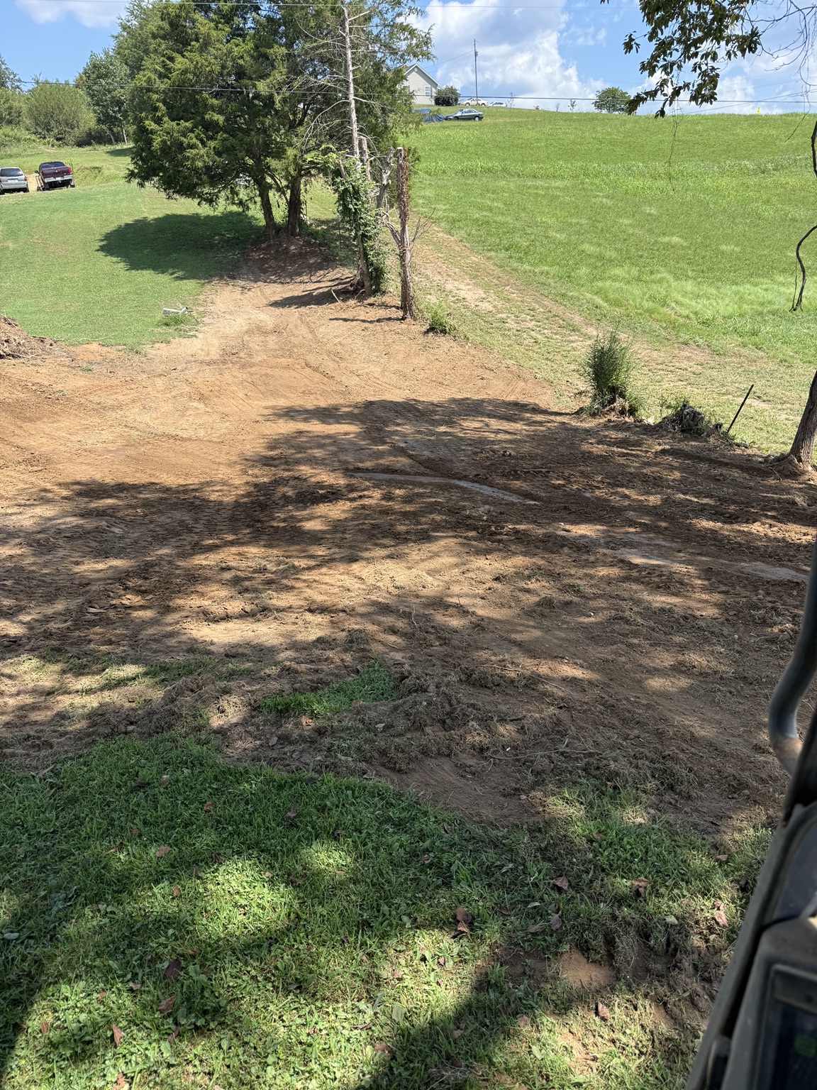 Cleared and prepared sloped property
