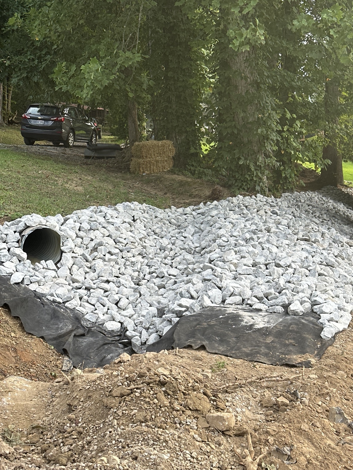 Drainage pipe and riprap installation